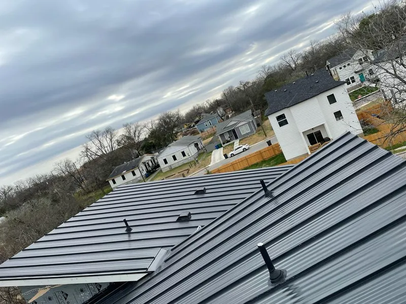 Standing seam metal roof panels with vents for Skylight Repair in Old Lyme